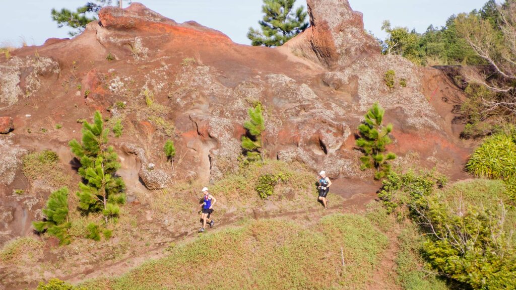 Two runners on the Peacock Challenge course