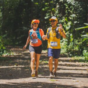 Couple running at the 2024 Maunawili Out and Back HURT trail race